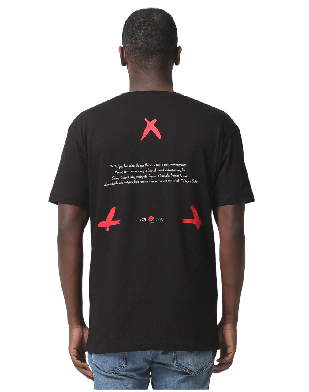 The back view of a man wearing a black t-shirt with red 'X' marks and text.
