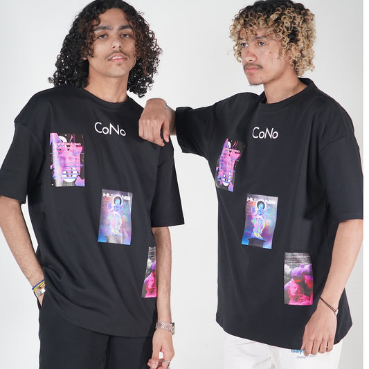Two people with curly hair standing side by side, wearing black t-shirts with colorful graphic designs.